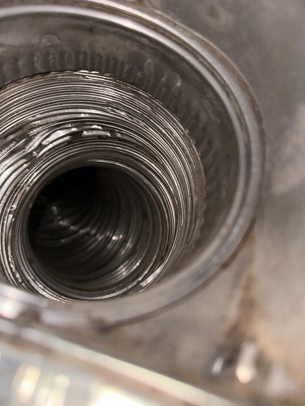 Dryer vent interior after heavy blockage removed